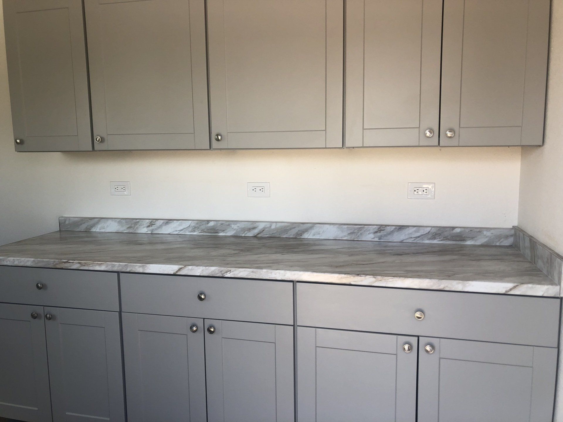 Custom and Multiple Wide interior office space with kitchen style cabintery