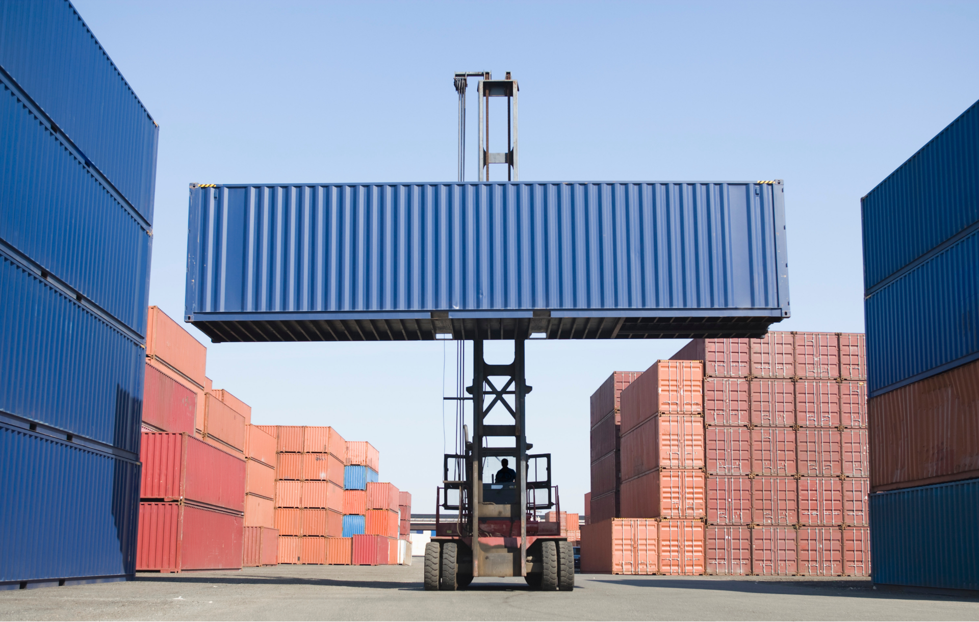 New (One Trip) 40' High Cube Shipping Container with Double Doors exterior on lift