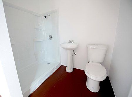 Custom Shipping Container Interior with toilet, sink and shower
