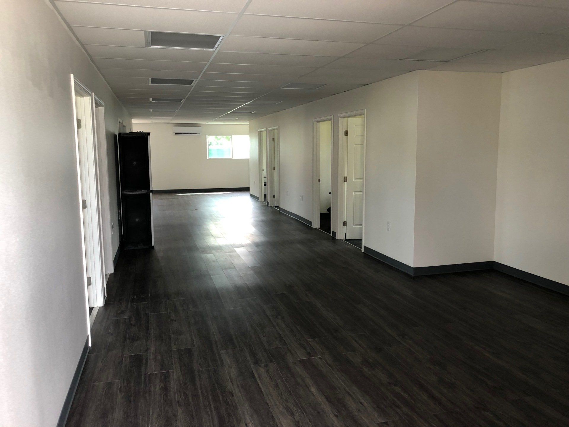 Custom and Multiple Wide interior office space with wide hall
