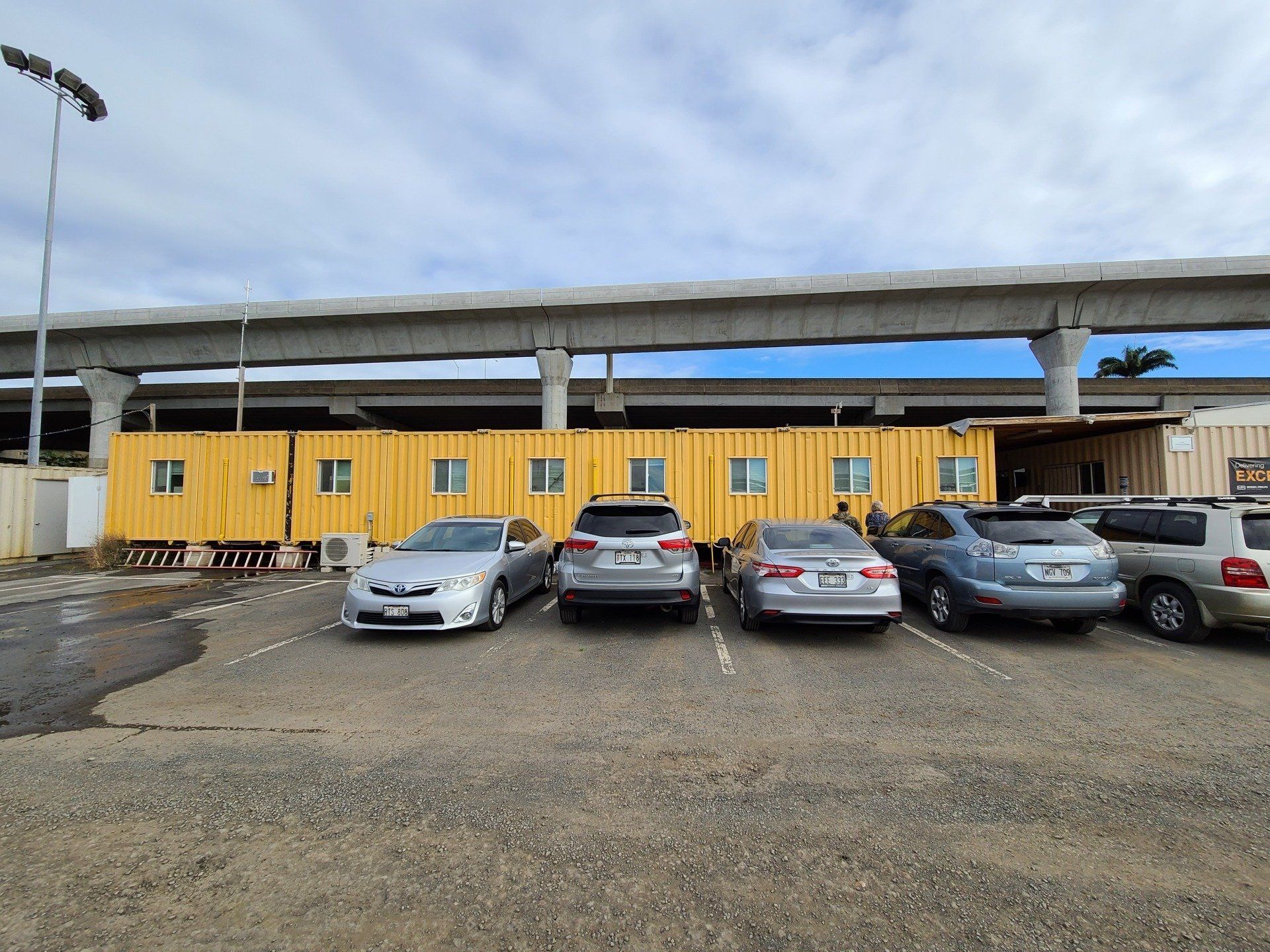 Multiple-Wide Office and Custom Space with windows and yellow exterior