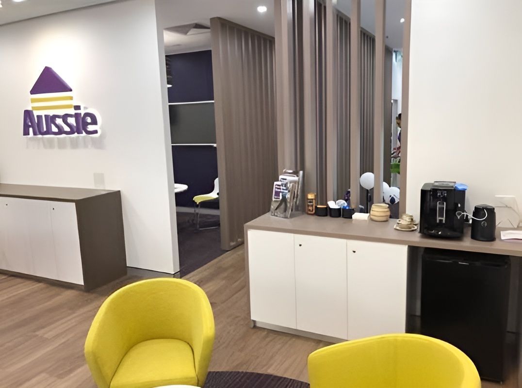 A Room With Yellow Chairs and a Sign That Says Aussie — GC Joinery in Sunshine Acres, QLD