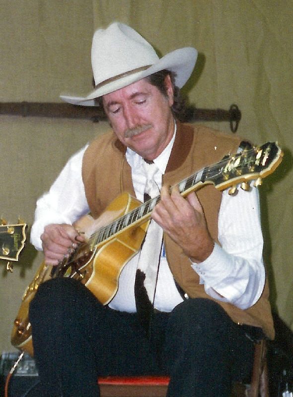 Tommy Morrell Playing Guitar