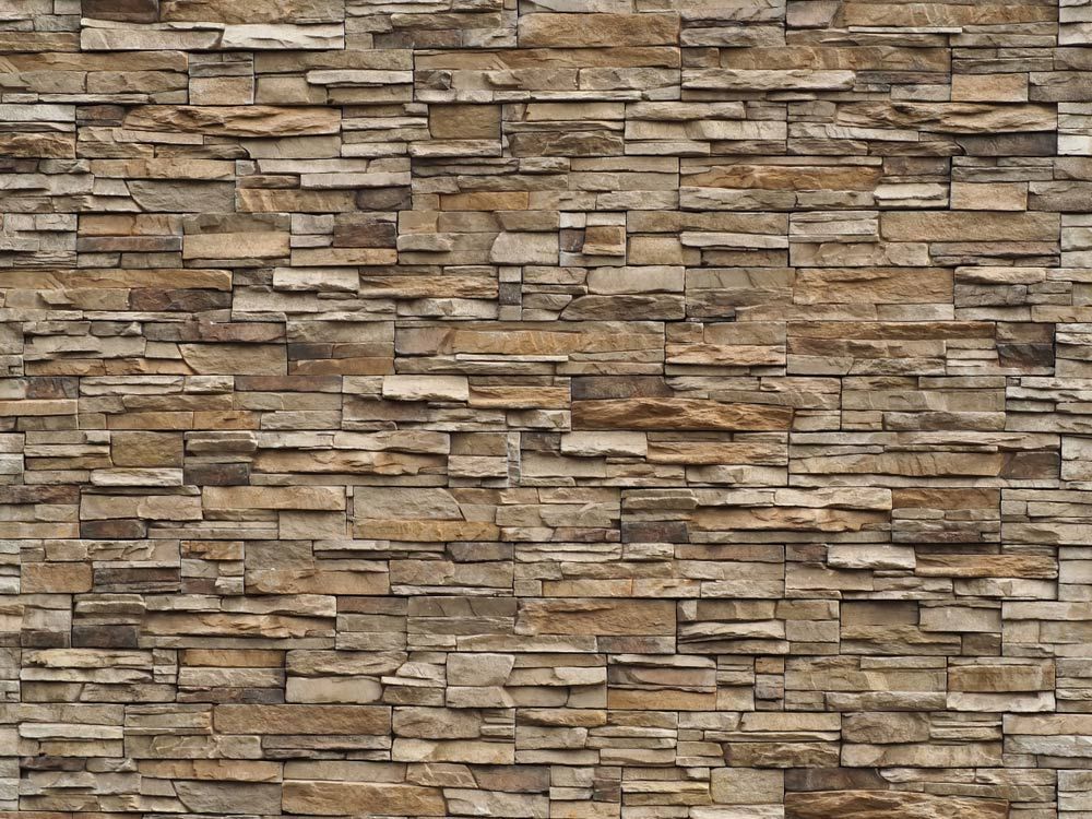 A Close Up of a Brick Wall With a Seamless Texture — Glen Lamberts Wall Cladding & Home Improvements in Pampoolah, NSW