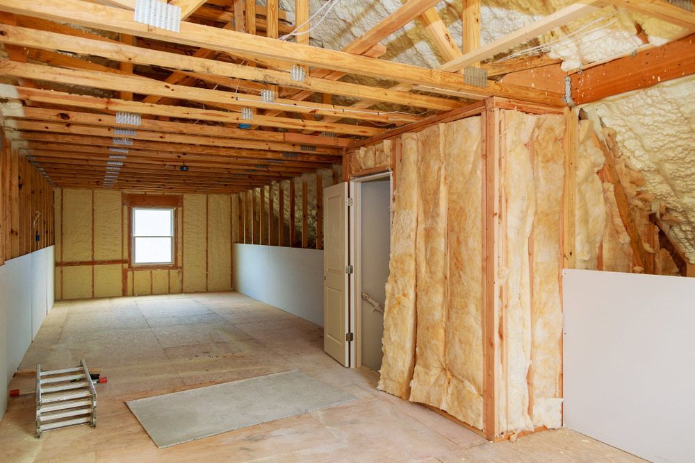 A Room in a House Under Construction With Insulation on the Walls and Ceiling — Glen Lamberts Wall Cladding & Home Improvements in Forster, NSW