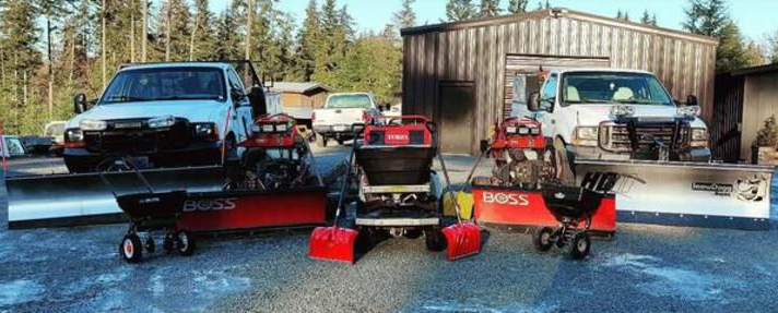 A neatly mowed lawn with a trench drain running through it.