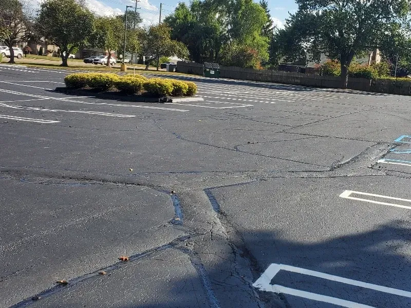 A freshly finished asphalt sealcoating job by DJs Paving, the go-to paving company for Canton and Farmington Hills, MI.