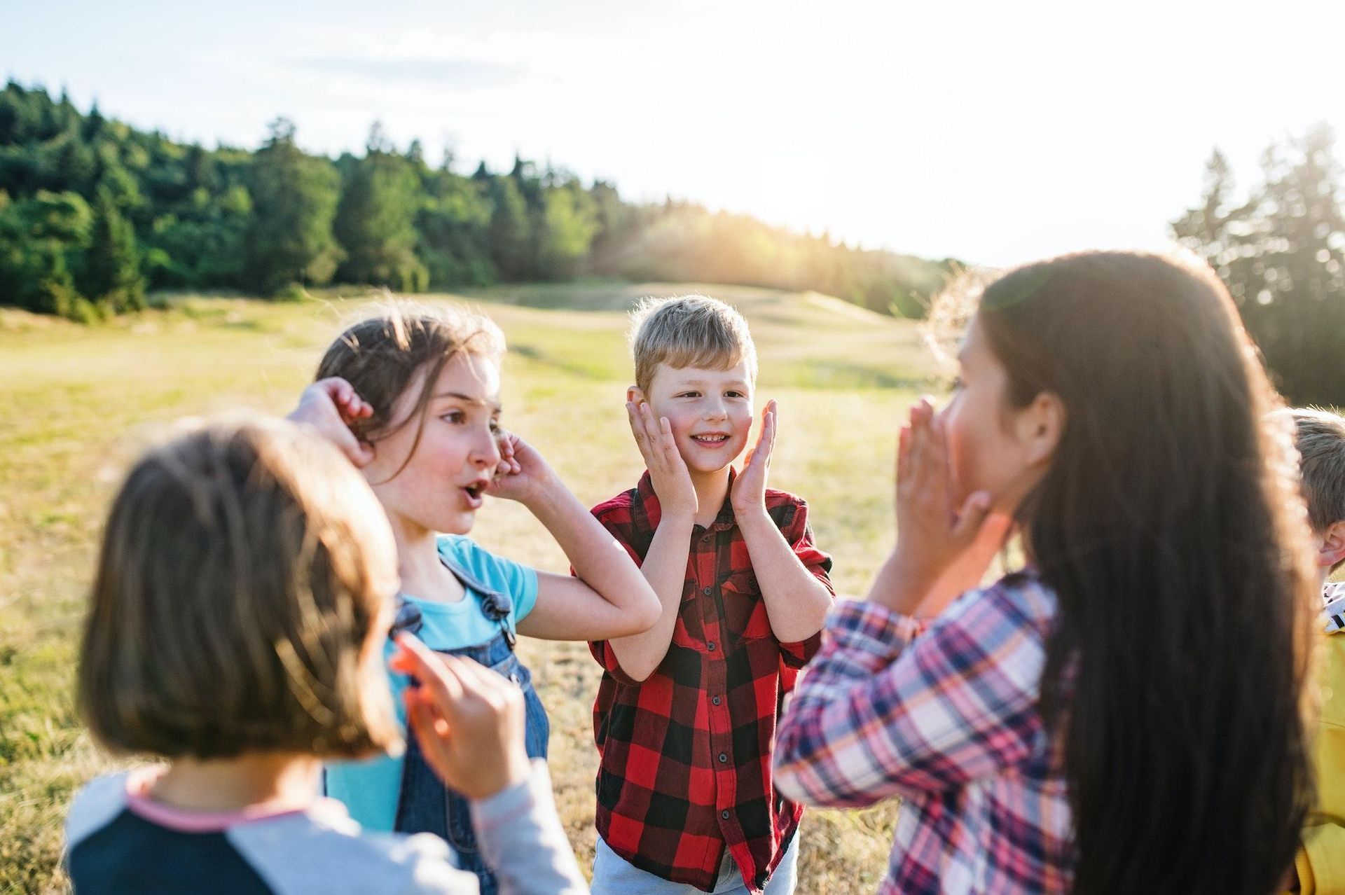 children communicating in a group setting