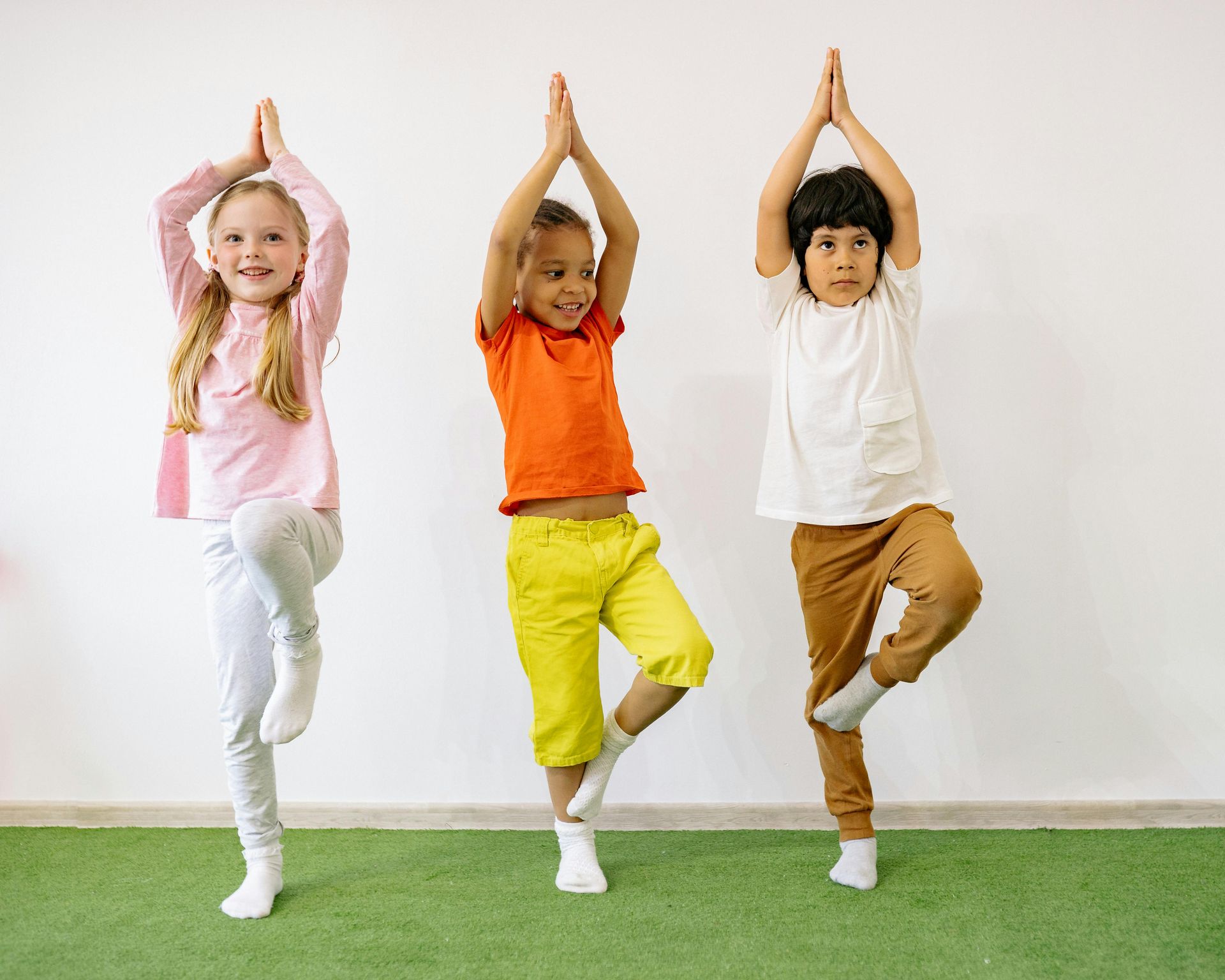 children practicing large motor skills