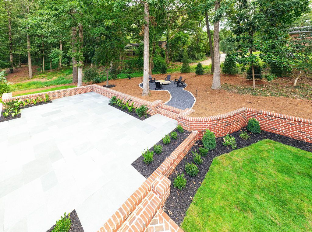 Antique Limestone Patio with landscaping.