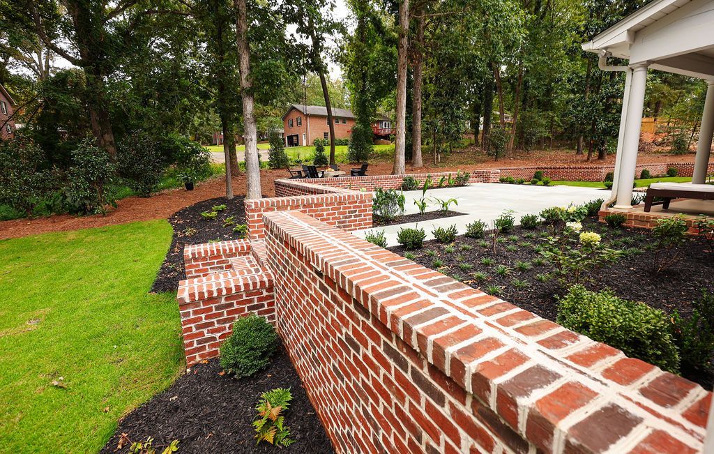 Traditional brick retaining wall with double row lock.