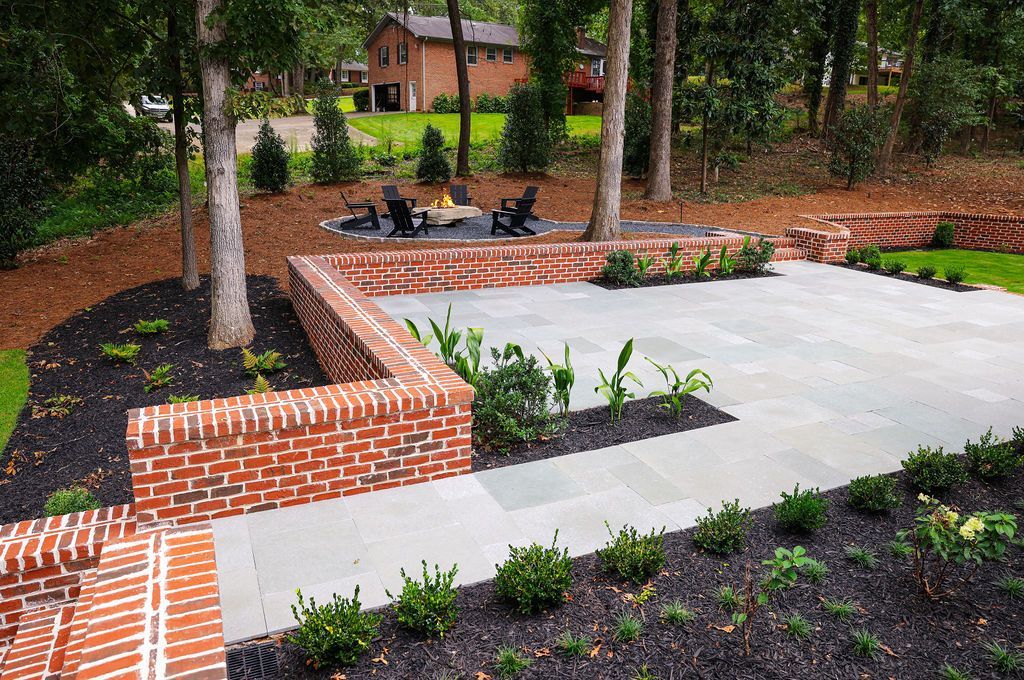 Brick retaining wall with Limestone patio