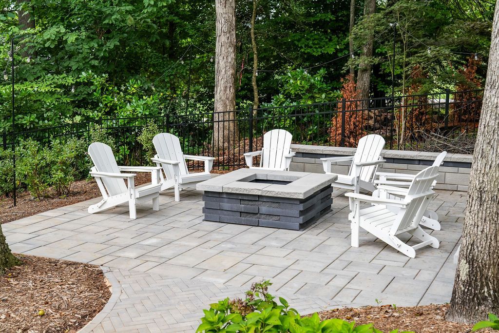 Techo Bloc Firepit with Adirondack chairs