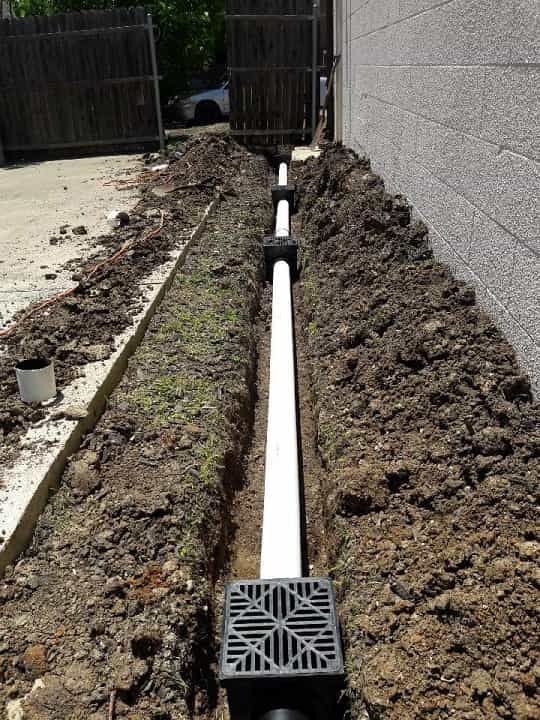 outdoor drain before being covered by dirt