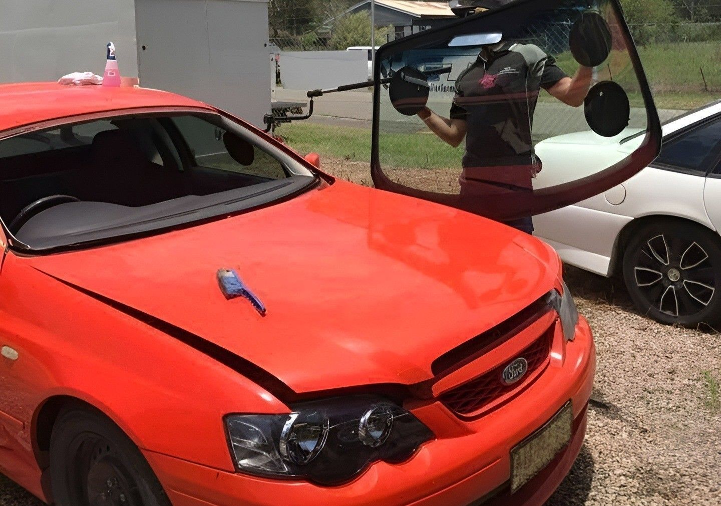 Windscreen Replacement on A Red Vehicle — Road Runner Windscreens in South Grafton, NSW