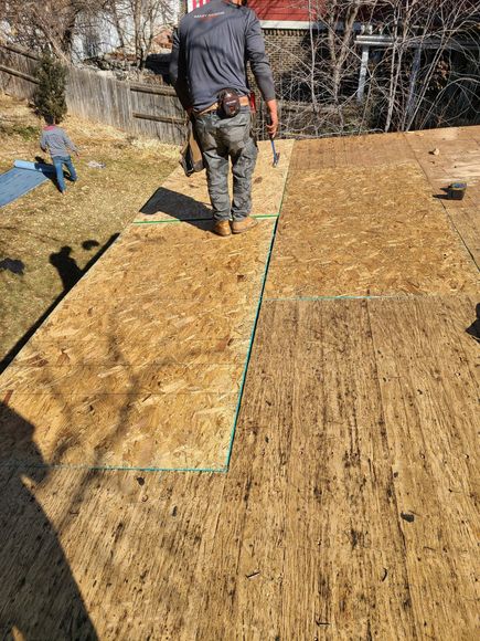 fixing  the wood  the yogi roofer  denver co roofing installer