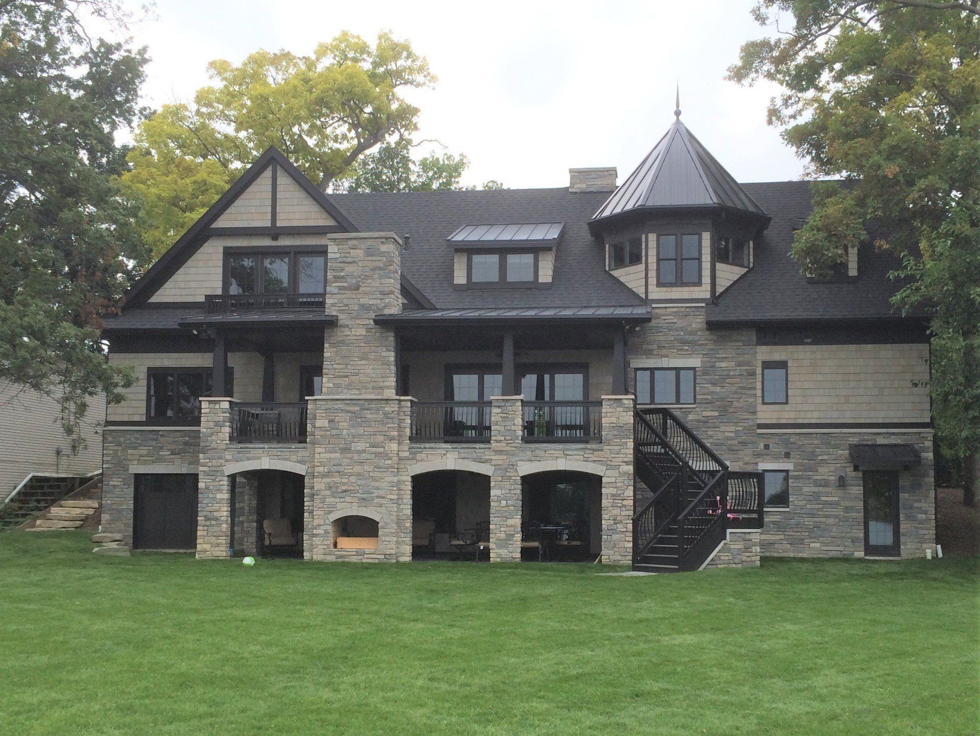 A large house with a tower on top of it