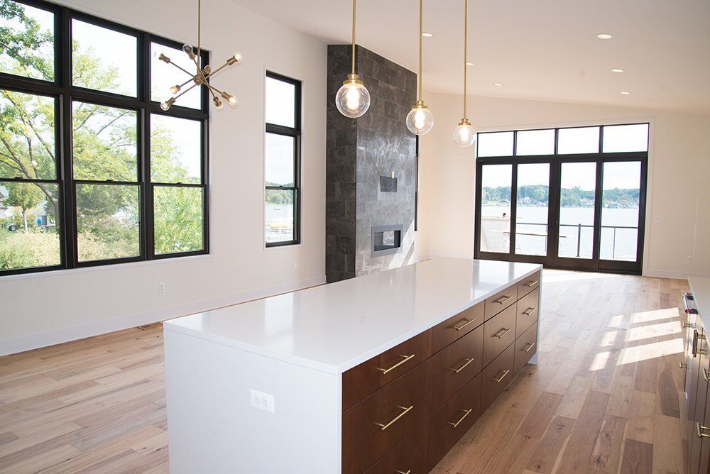 There is a large island in the middle of the room.