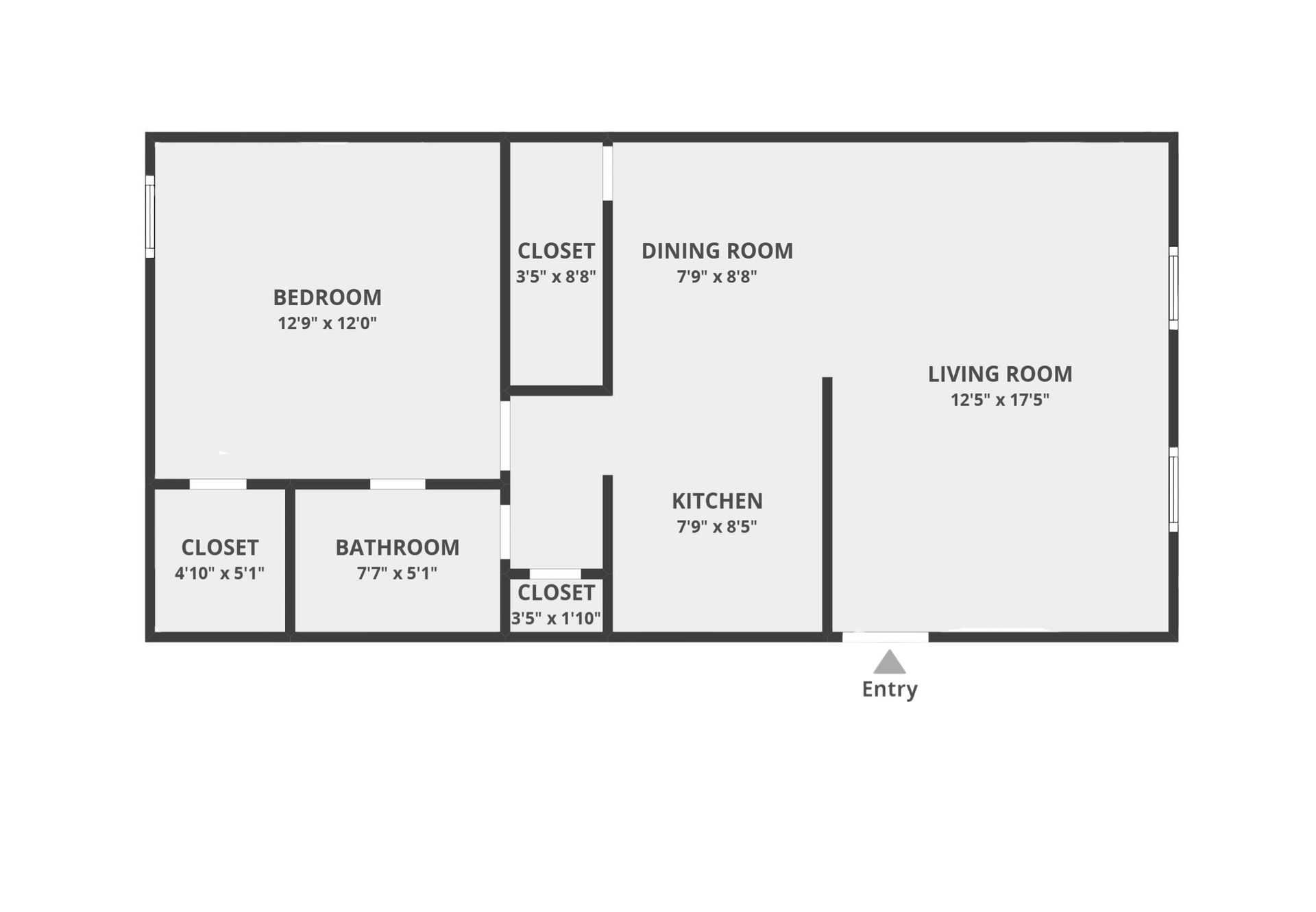 Floor plan of an apartment layout with a bedroom, living room, kitchen, and closet spaces.