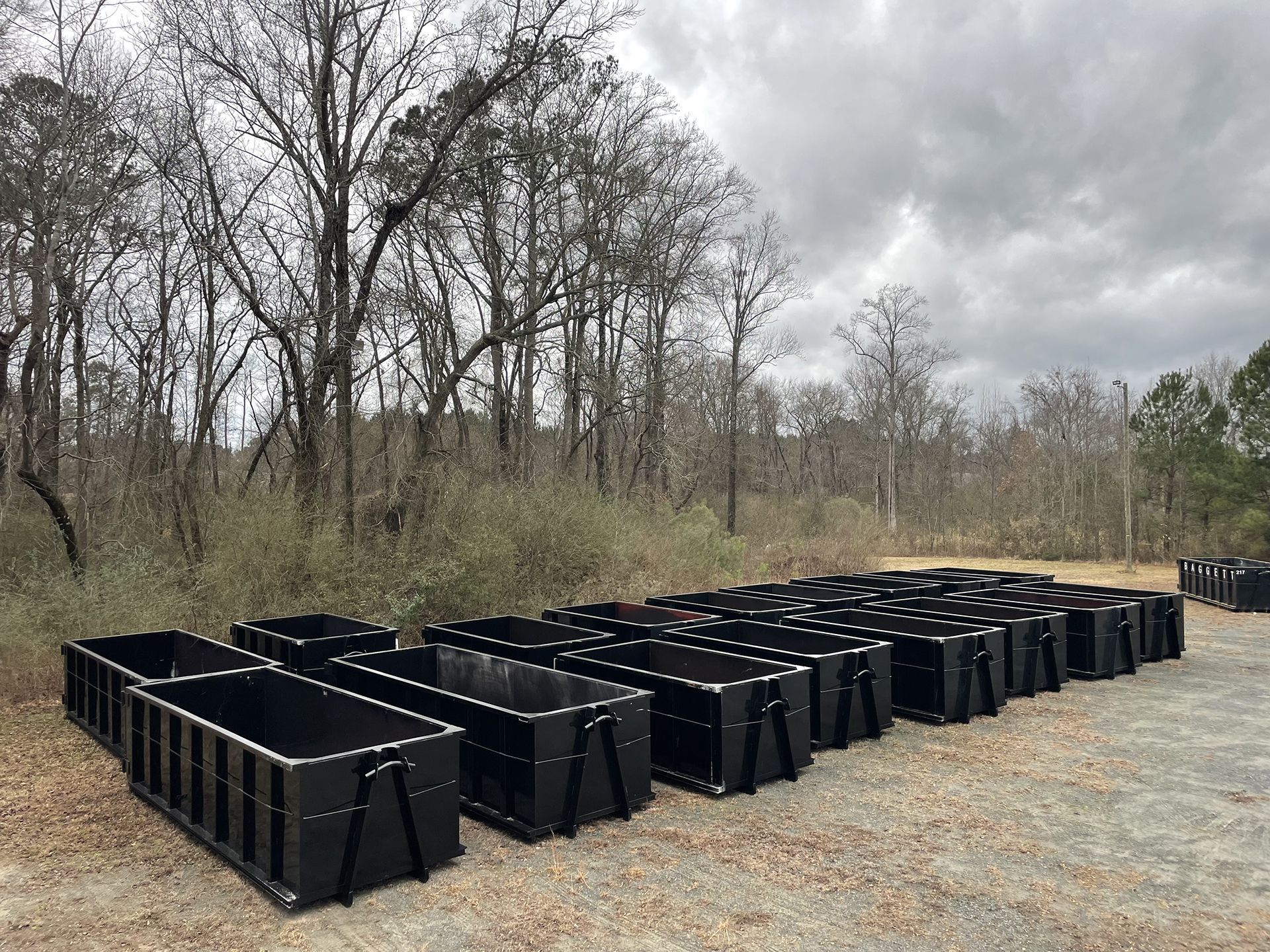 Multiple roll-off dumpsters for demolition services in Cary and Apex, NC