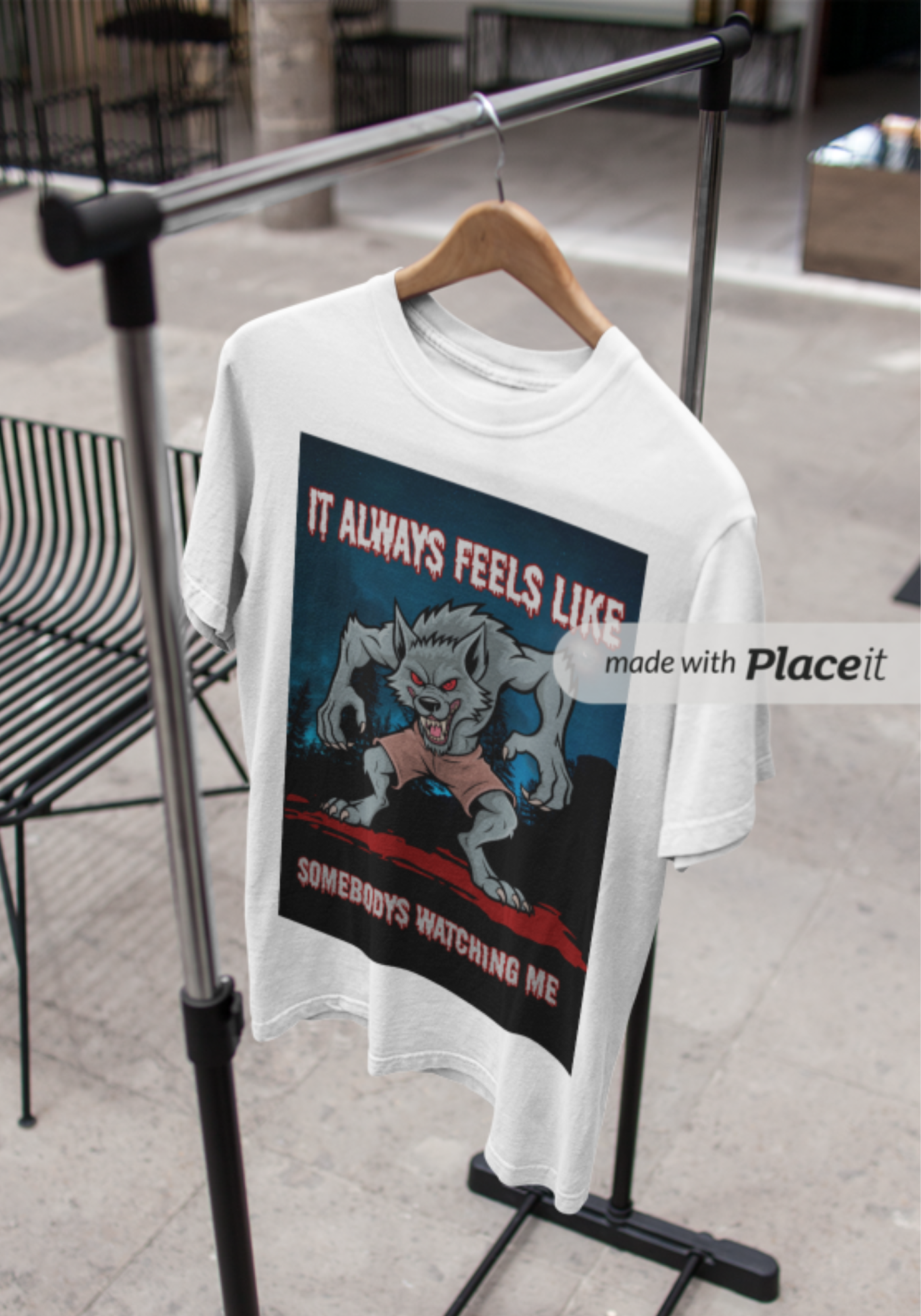 White t-shirt with a werewolf graphic and the text