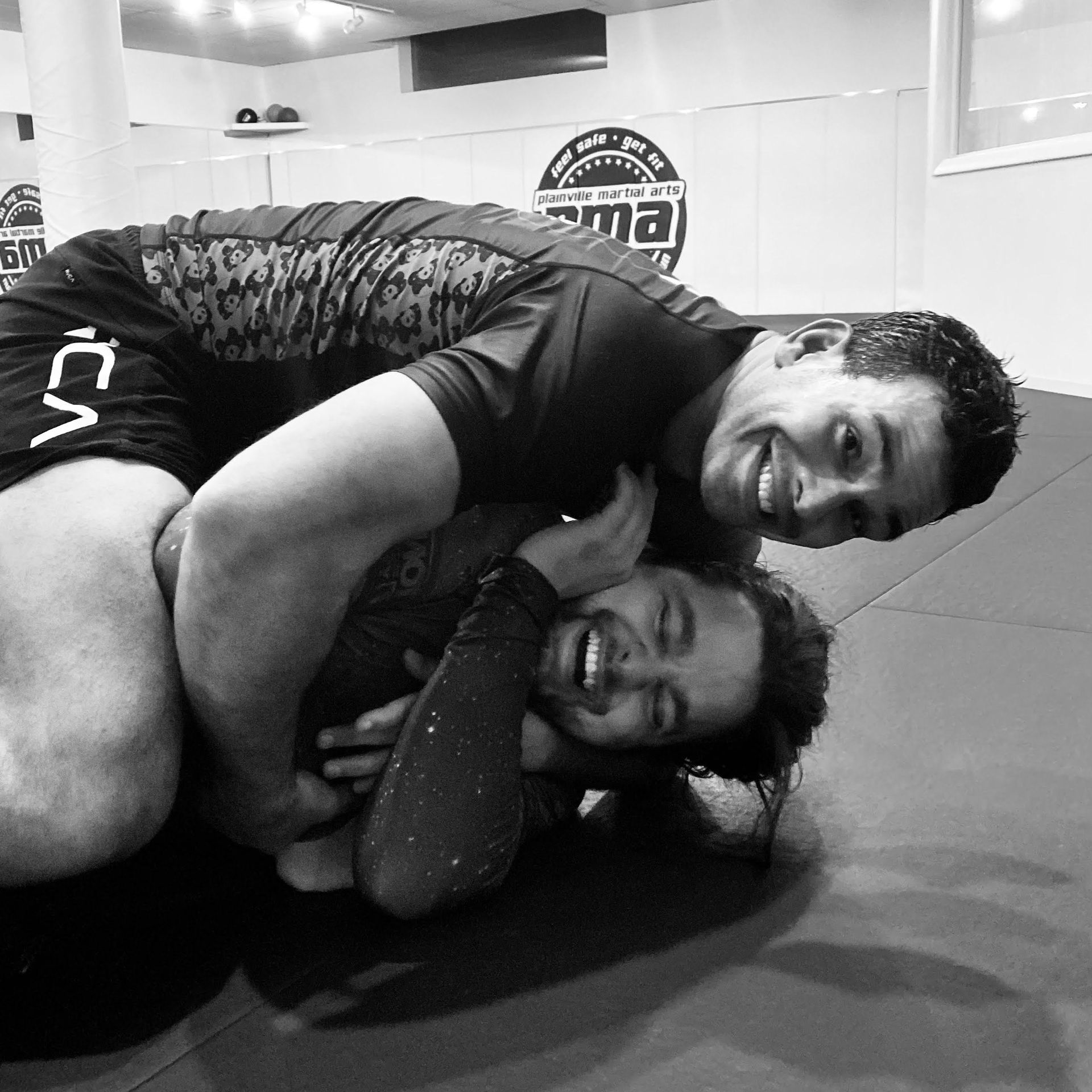 Adults practicing focused martial arts drills at Plainville Martial Arts in Plainville, CT.