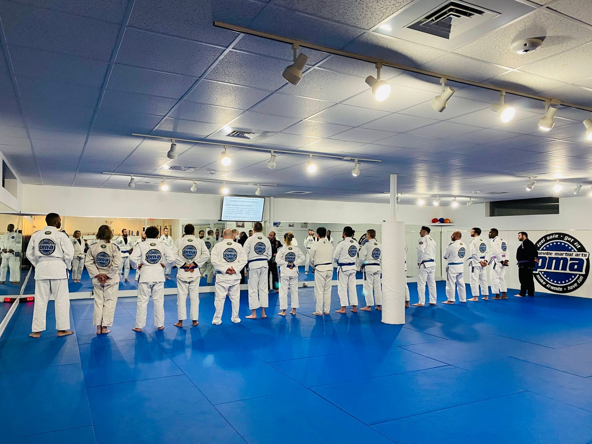 Students practicing partner drills at Plainville Martial Arts in Plainville, CT, building confidence and focus.