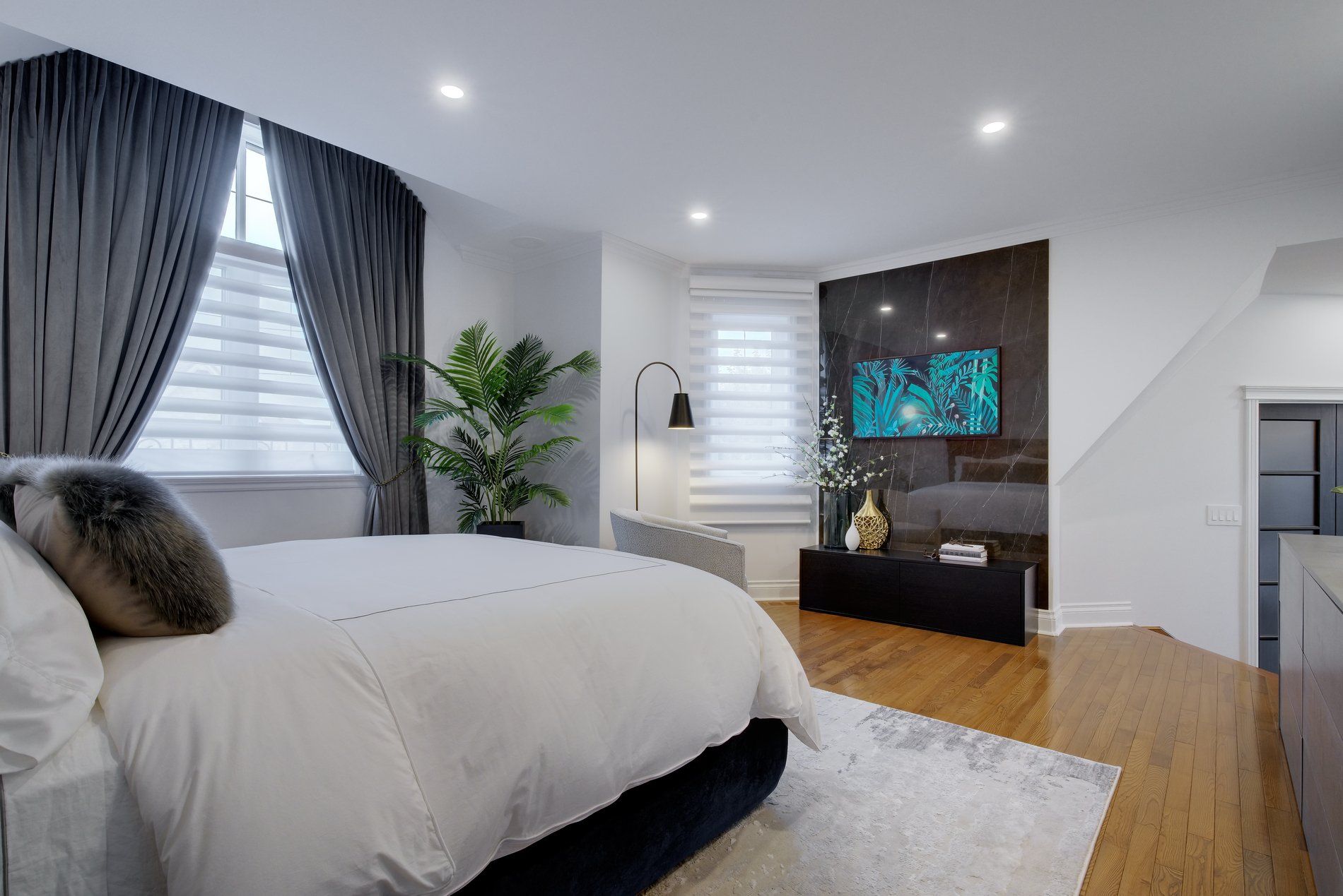 There is a large bed in the middle of the room.