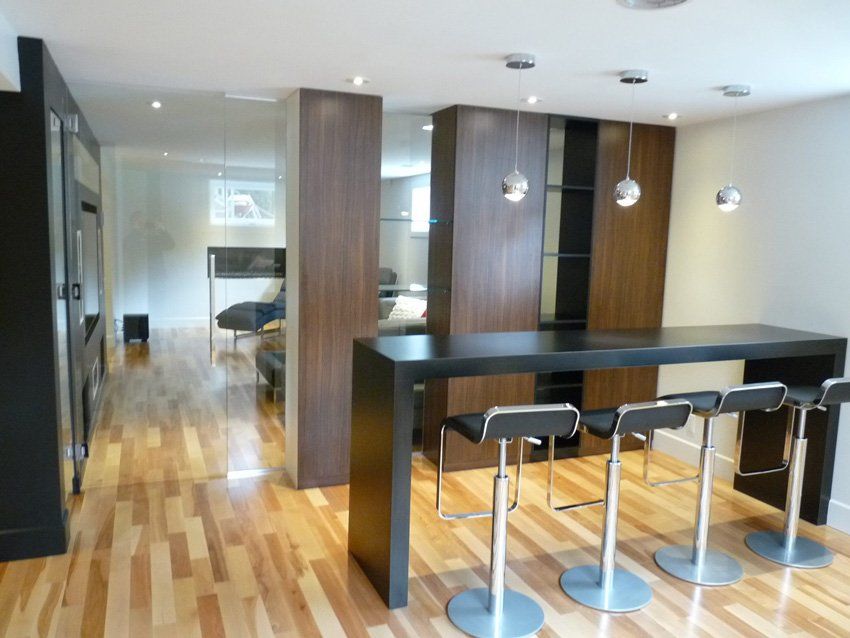 large modern home with light wood flooring