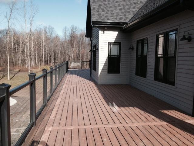 big composite patio with black railing