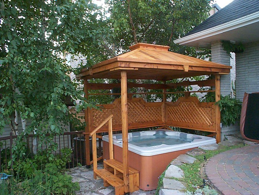 outdoor wooden gazebo over a spa