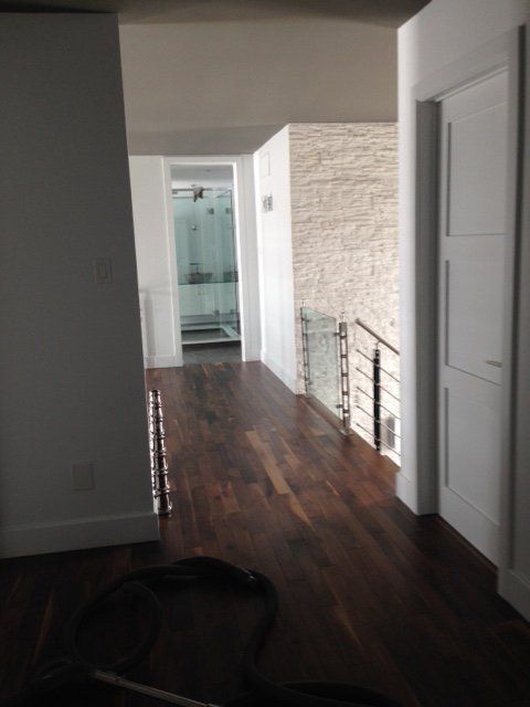 hallway with shining wood floors
