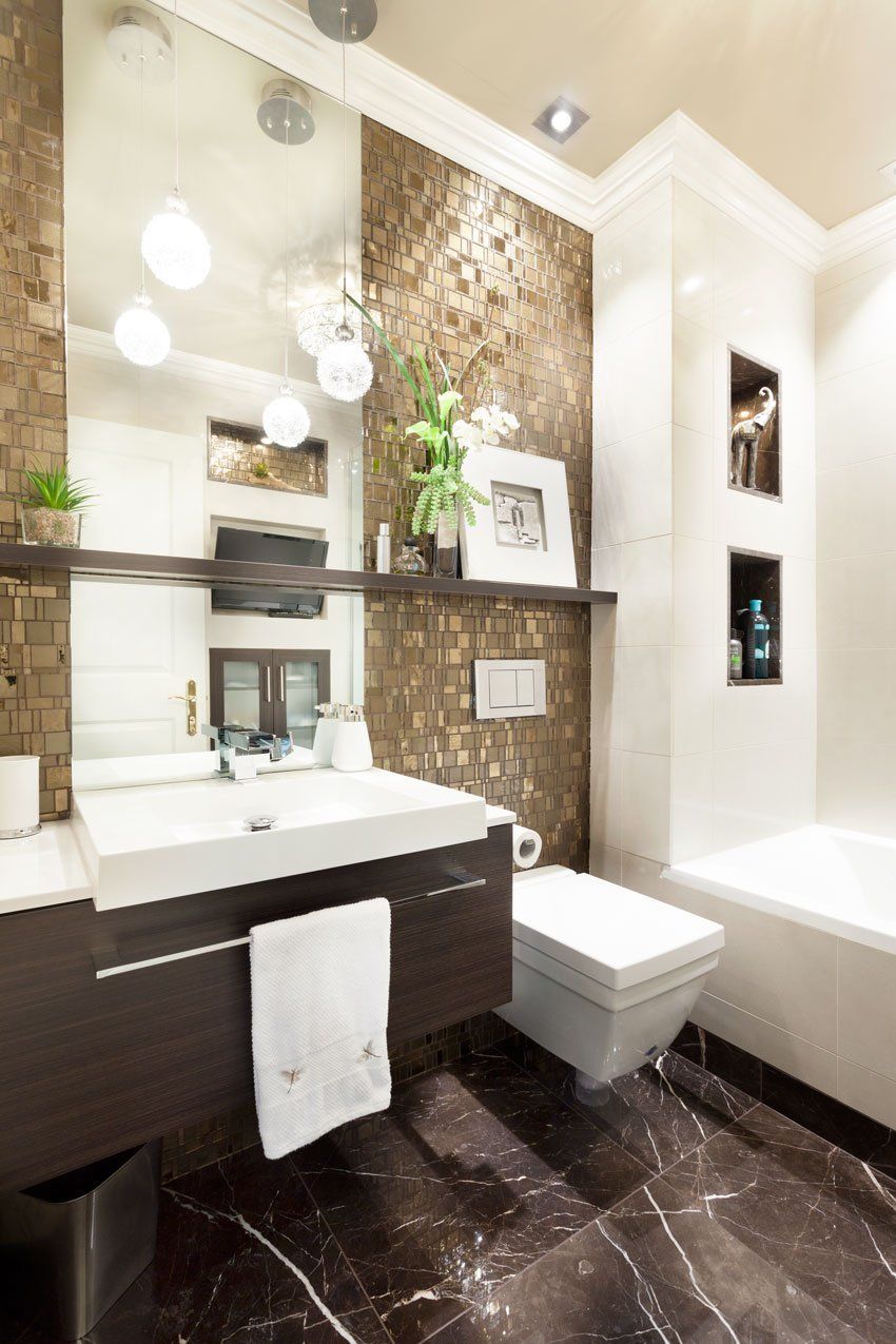 luxurious modern bathroom with with dark brown cabinets