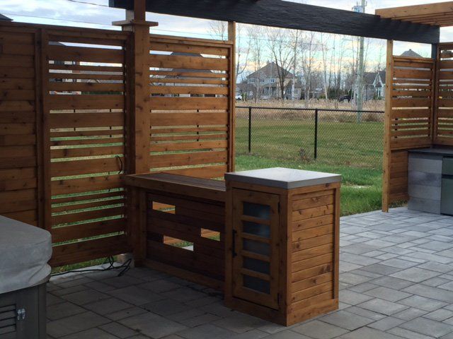 wooden outdoor kitchen with unistone