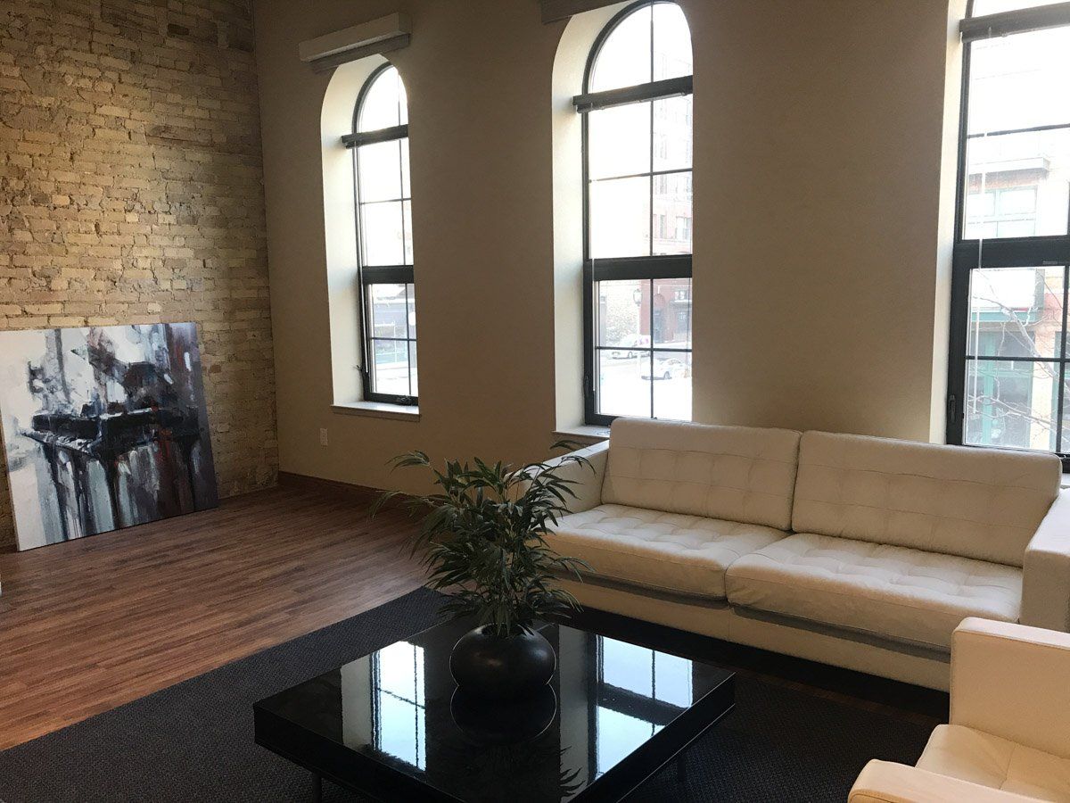 Large arched windows in living area | Mabbett & Breeds