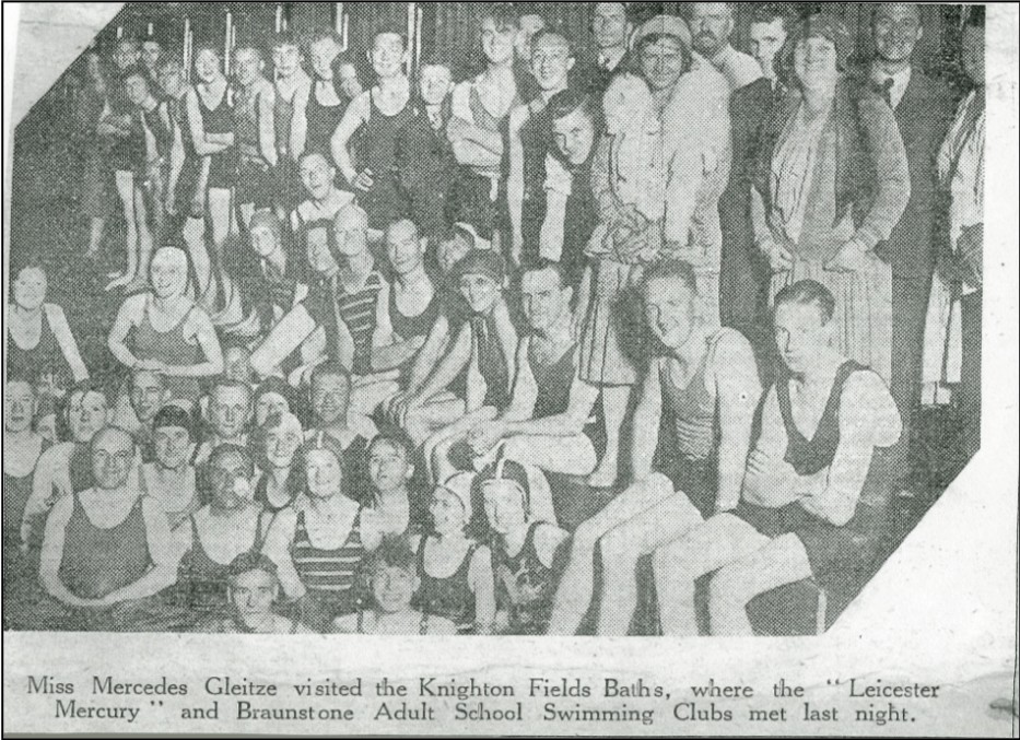 Mercedes on poolside with many other swimmers