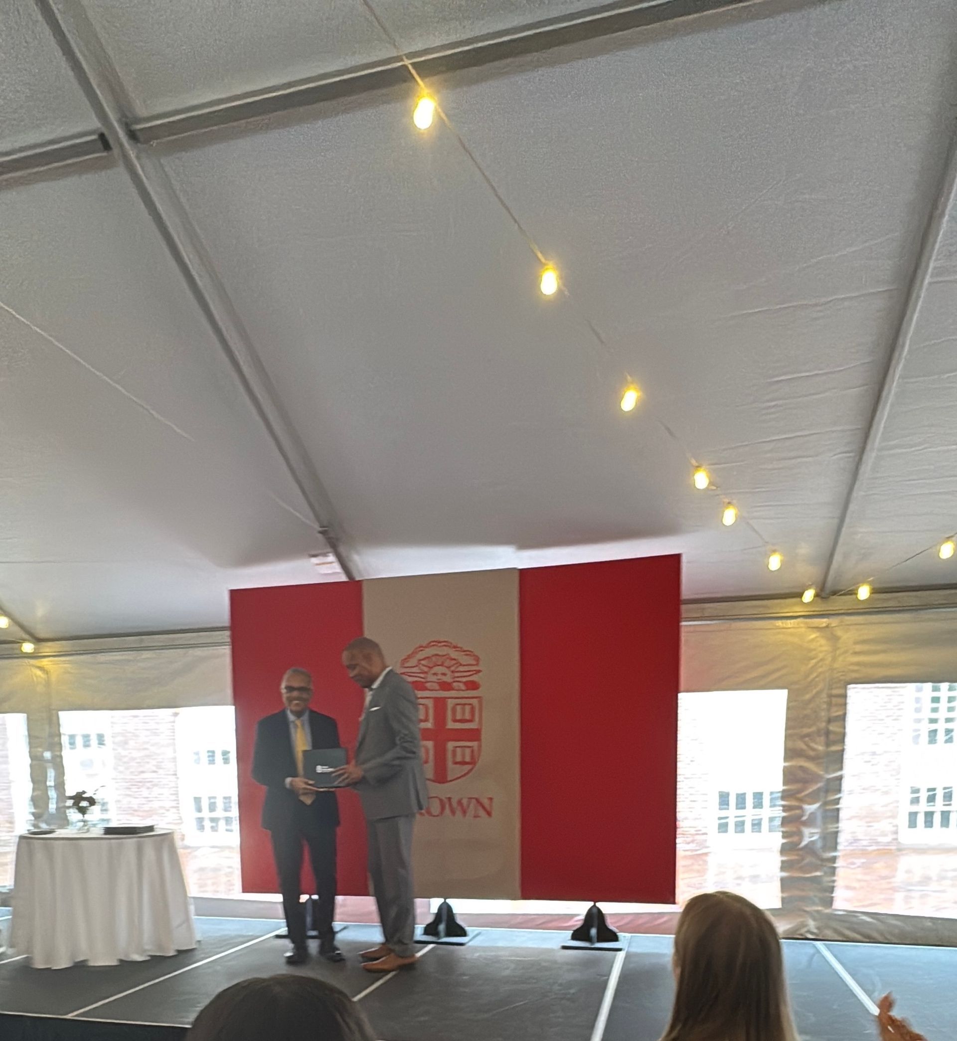 Dr. Troy Nash receiving the Public Health Impact Award