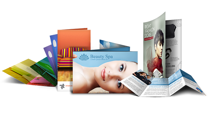 A bunch of brochures with one that says beauty spa on it