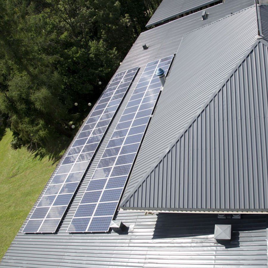 Solar Panel On Sheet Metal Roof — Roofer In Old Bar, NSW