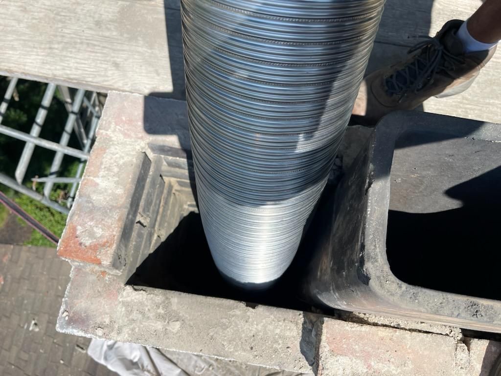 Chimney liner being installed in Portland, OR