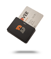 A credit card is sitting on top of a card reader.