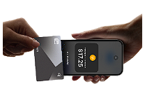 A person is putting a credit card into a cell phone.