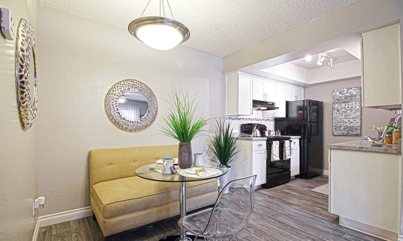 Interior of apartment with view to kitchen and dining area