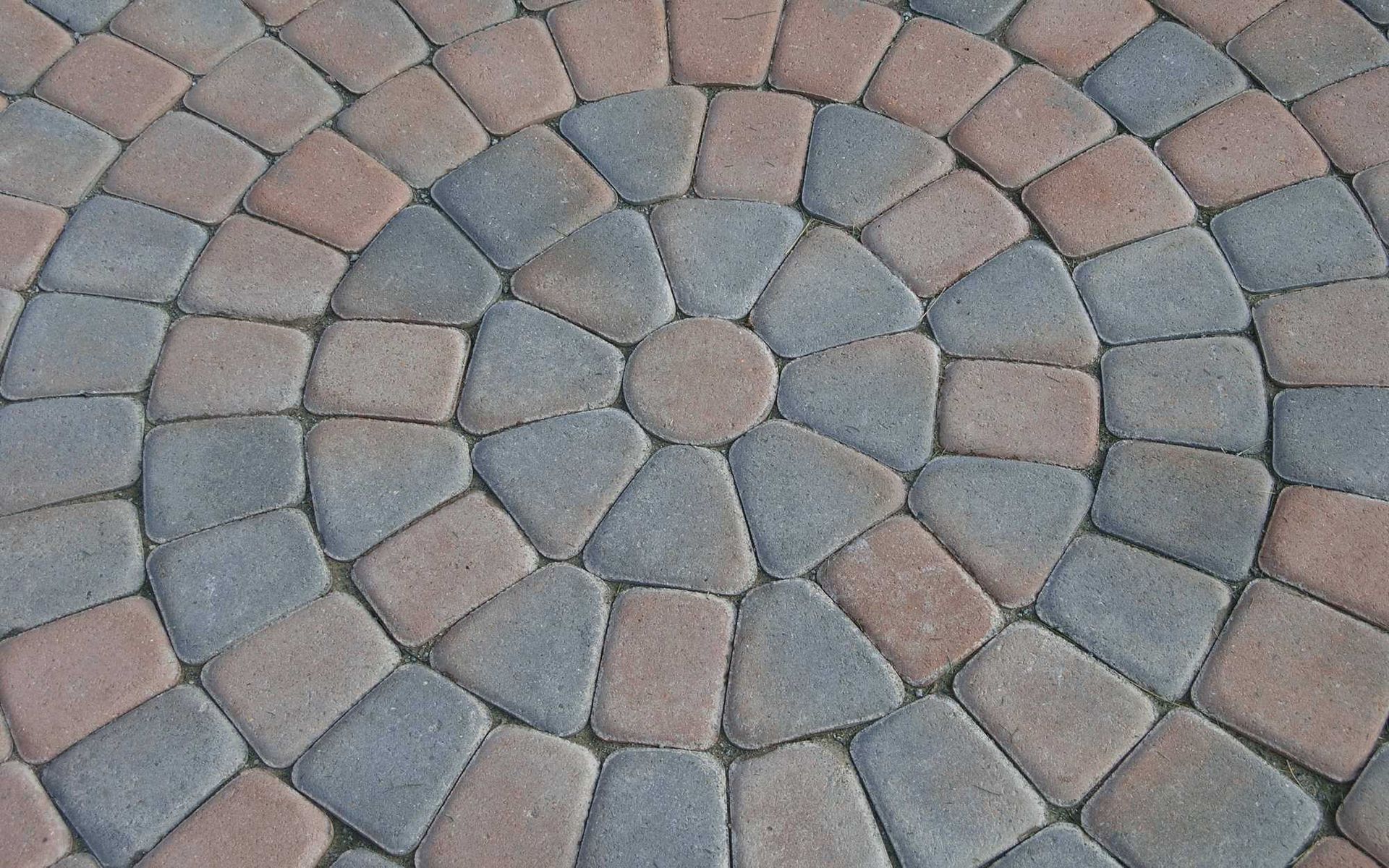 colored pavers in circular pattern