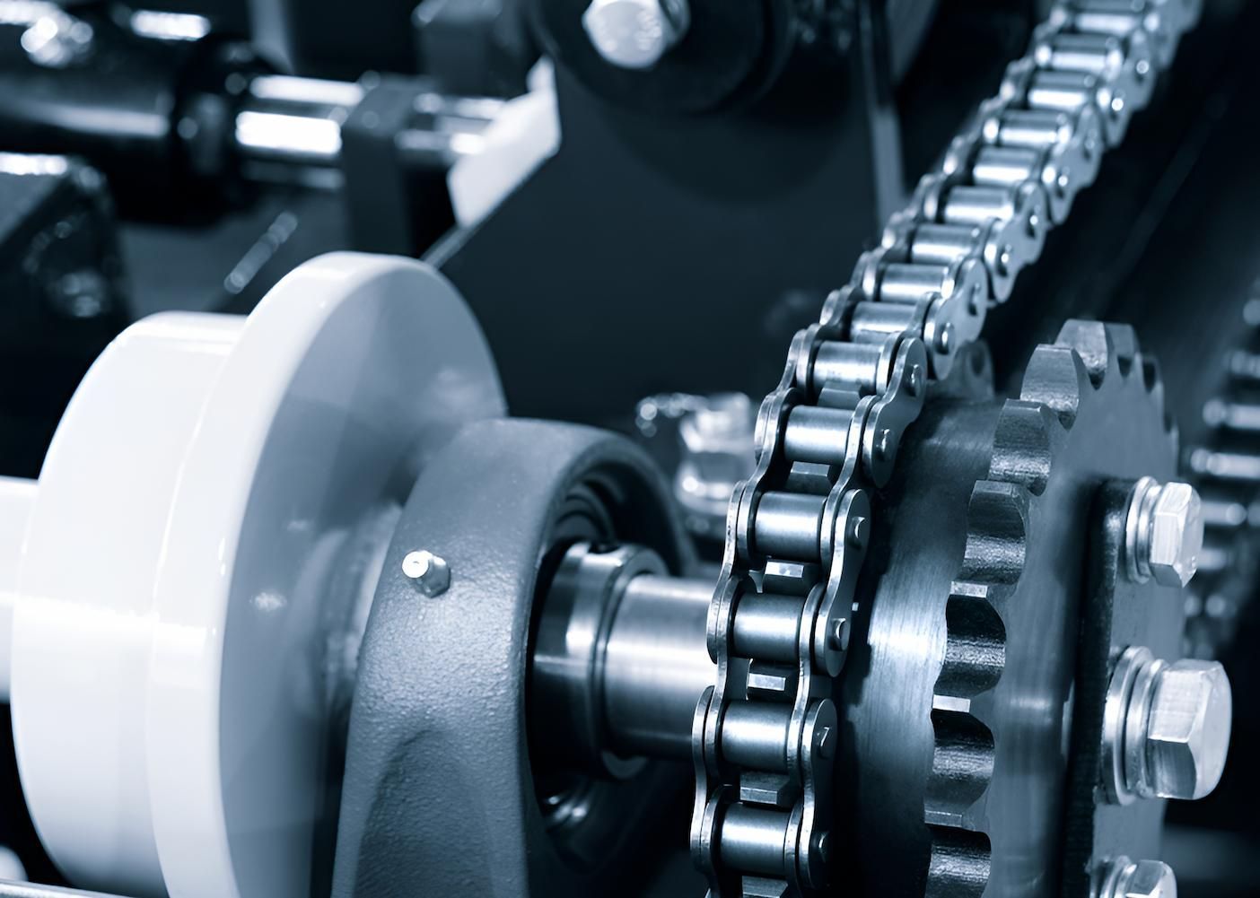 A Close Up of a Chain and Gears on a Machine — Mid Coast Bearing Centre in Forster, NSW