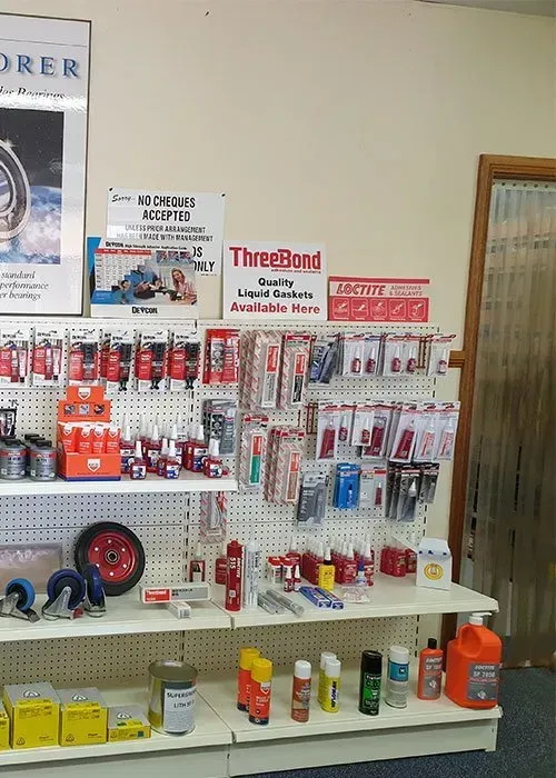 Hardware store display of ThreeBond and other products, including lubricants and sealants. — Mid Coast Bearing Centre in Taree, NSW