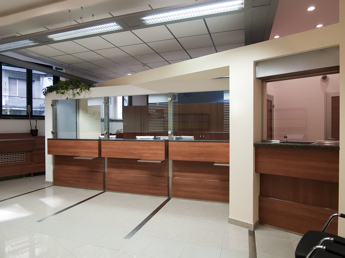 A large room with wooden counters and a window