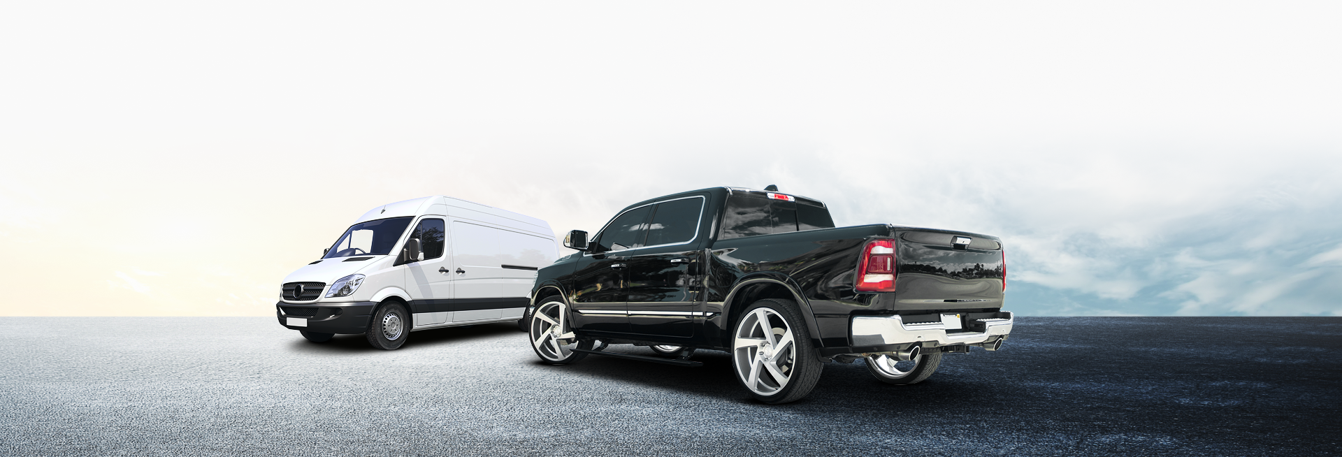 white van and dark truck parked on road | Noller Fleet & Auto Service