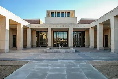 Burleson Electrician - Covered pavilion with a star emblem at Pana'ewa Park, surrounded by a partly cloudy sky.