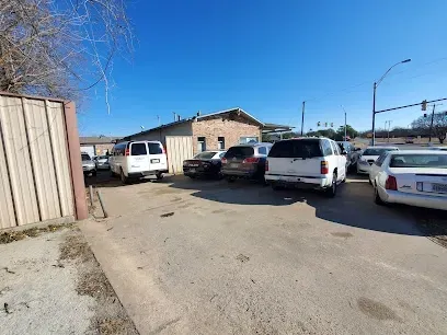 Burleson Electrician
- Playground scene with children on a blue slide and swings. A colorful climbing structure sits nearby.